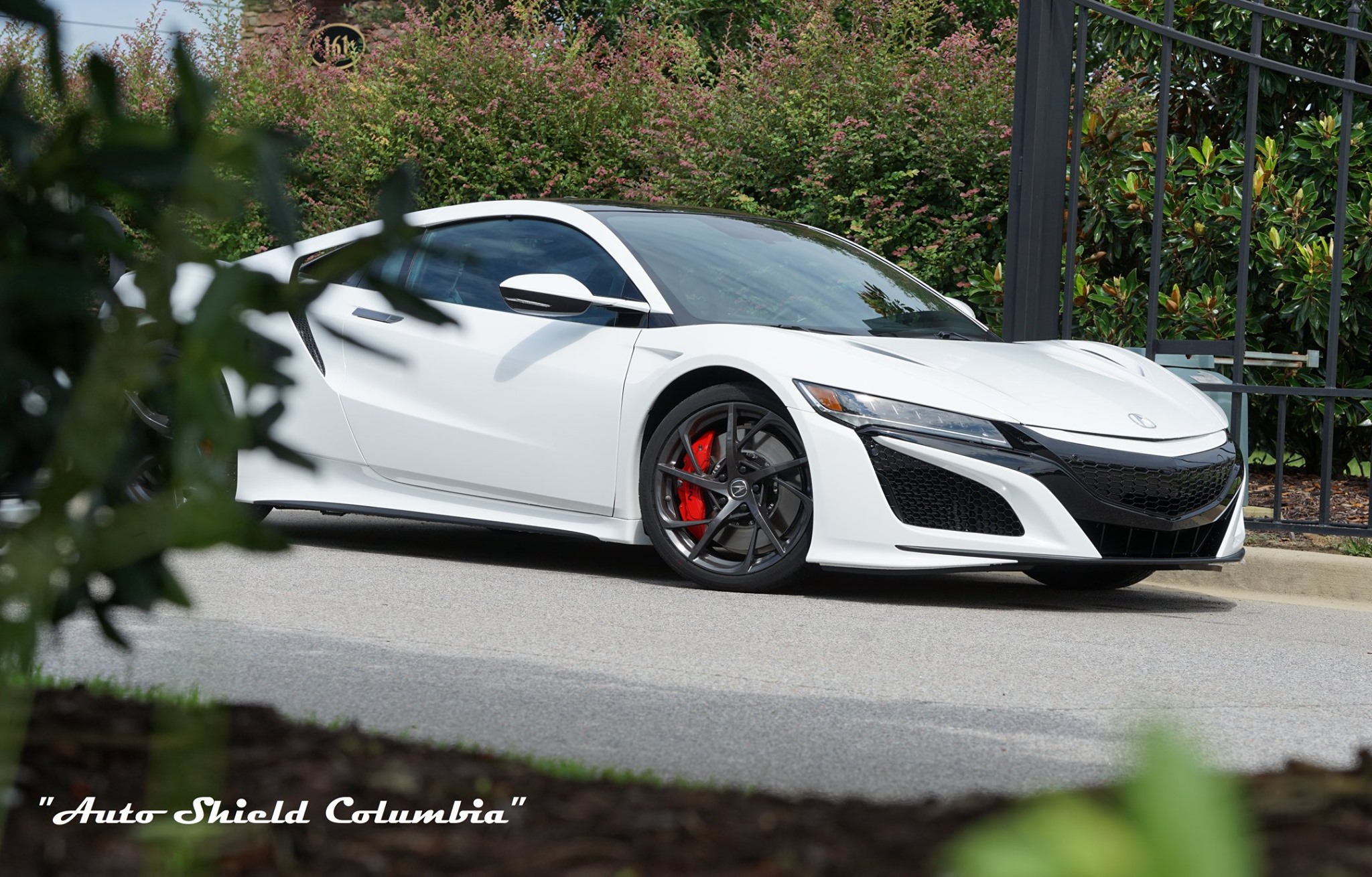 premium white sports car using special discounts